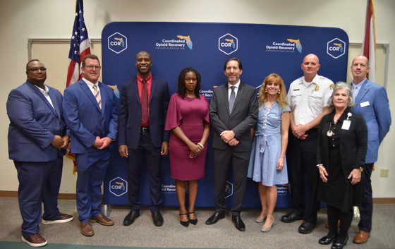 State Surgeon General Dr. Joseph Ladapo, Deputy Secretary for Health Dr. Kenneth Scheppke, and Florida Department of Children and Families Deputy Secretary for Substance Abuse and Mental Health Erica Floyd Thomas, alongside community partners